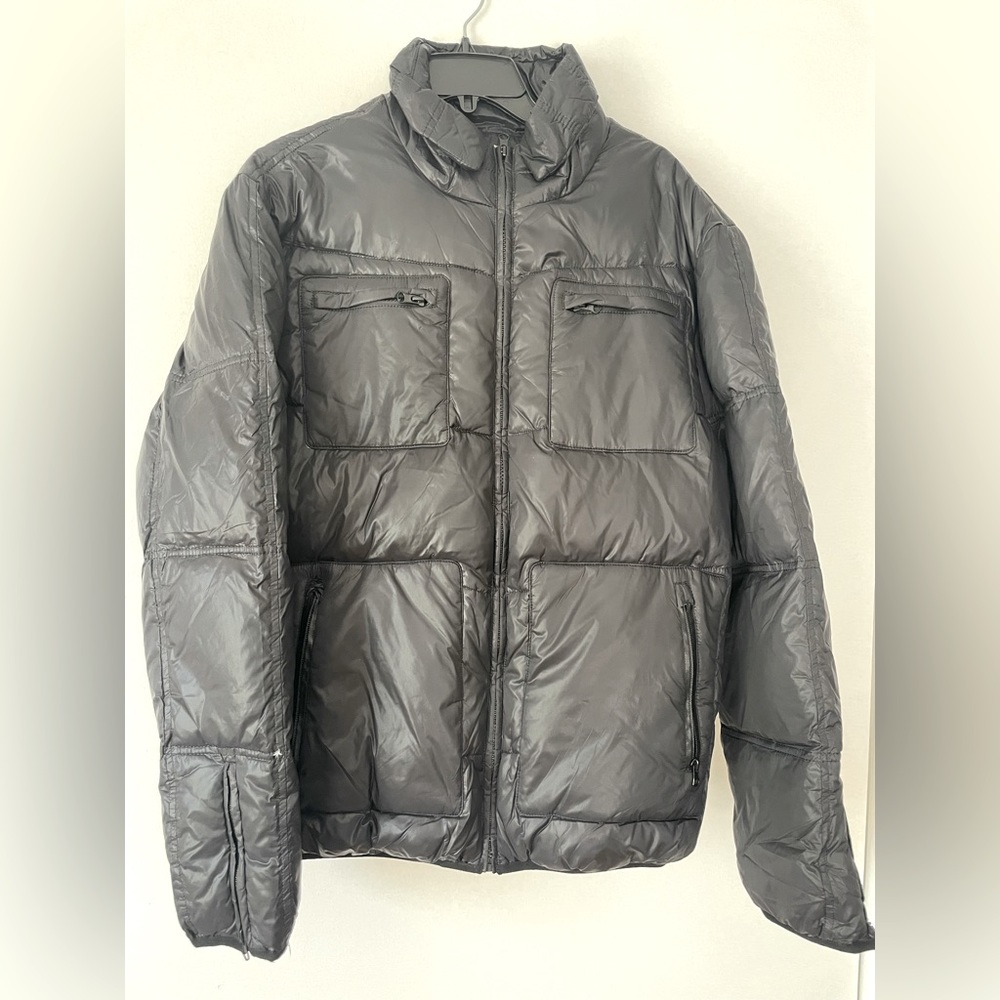 Never worn, very warm, down, black winter coat sized XXL (runs small).